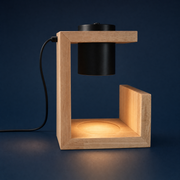 SOMNEVIA Glow candle warmer lamp on midnight-blue background
